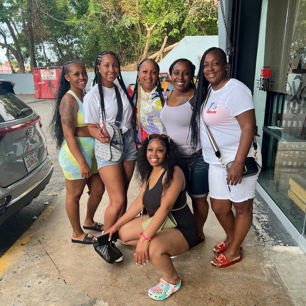 This is my family as we posed outside the restaurant after eating. All smiles and a full satisfied belly.