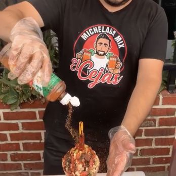 Michelada Mix El Cejas - Jesse (owner) preparing a Michelada Cup with Ceviche - Specialty Food Near Me - Stockton, California Michelada Mix El Cejas - Jesse (owner) preparing a Michelada Cup with Ceviche - Specialty Food Near Me - Stockton, California