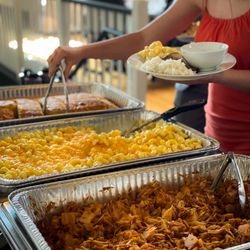 Spork Bytes - Smoked pulled jackfruit, mac and cheese, and cornbread from local restaurant Miss Delta at an event venue.