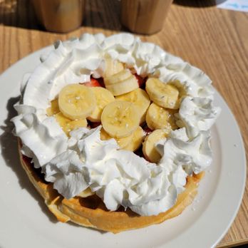 Art's Corner Cafe - Belgian waffle with strawberries, bananans and whipped cream. - Breakfast & Brunch Near Me - Ventura, California