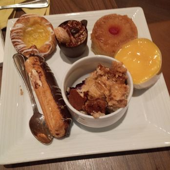 Fresh Harvest Buffet - Dad's dessert plate. Eclair, pineapple cake, bread pudding, Danish, chocolate cup - Buffets Near Me - Tampa, Florida Fresh Harvest Buffet - Dad's dessert plate. Eclair, pineapple cake, bread pudding, Danish, chocolate cup - Buffets Near Me - Tampa, Florida