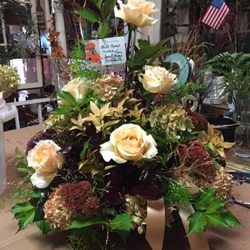 Paradox - This is a beautiful custom bouquet made for a funeral with a seasonal selection of flora