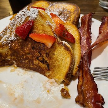 Famous Toastery - Stuffed French toast should just be called two pieces of bread with a fruit spread between them. - Breakfast & Brunch Near Me - Charlotte, North Carolina Famous Toastery - Stuffed French toast should just be called two pieces of bread with a fruit spread between them. - Breakfast & Brunch Near Me - Charlotte, North Carolina