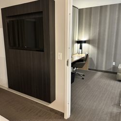 Residence Inn By Marriot - Tv in bedroom and entrance to living room with tv as well