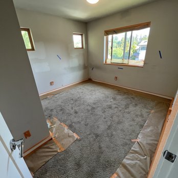 Ambrosia Painting - Peeping the room for paint. Trims, switches, etc we're carefully taped off. - Painters Near Me Ambrosia Painting - Peeping the room for paint. Trims, switches, etc we're carefully taped off. - Painters Near Me