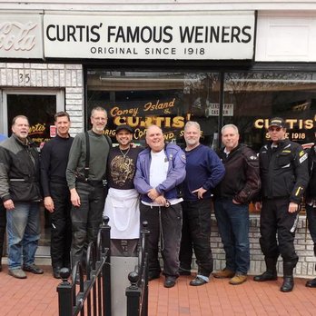 Curtis Famous Weiners - March 25, 2017.  Our group of motorcycle riders descended on Gino's place and had our picture taken with him. - Hot Dogs Near Me - Cumberland, Maryland