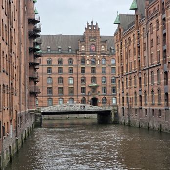 Speicherstadt - A close-up of the Neo-Gothic Sandtorkai-Hof from the bridge - Landmarks & Historical Buildings Near Me