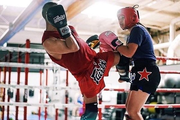 Muay Thai - Authentic Muay Thai is taught in a fun and accessible way. Each class is a 1-hour group class consisting of warm-ups, technique of the day, partner drills on heavy bags and thai pads, fundamentals, tactics and conditioning. If you are brand new to the art we also offer semi-private Intro to Striking classes.
For more advanced members we offer Muay Thai Sparring and Muay Thai Tactical Sparring classes. These advanced classes require coach approval, sparring waiver and additional gear.
Muay Thai Tactics
Using bio-mechanics, this class focuses on the science of movement for each strike. By reinforcing the building blocks of striking and other tactical drills we help you improve your strikes to get the most out of each technique. These are excellent classes that help you gain confidence in your striking abilities and power. Muay Thai - Authentic Muay Thai is taught in a fun and accessible way. Each class is a 1-hour group class consisting of warm-ups, technique of the day, partner drills on heavy bags and thai pads, fundamentals, tactics and conditioning. If you are brand new to the art we also offer semi-private Intro to Striking classes.
For more advanced members we offer Muay Thai Sparring and Muay Thai Tactical Sparring classes. These advanced classes require coach approval, sparring waiver and additional gear.
Muay Thai Tactics
Using bio-mechanics, this class focuses on the science of movement for each strike. By reinforcing the building blocks of striking and other tactical drills we help you improve your strikes to get the most out of each technique. These are excellent classes that help you gain confidence in your striking abilities and power.
