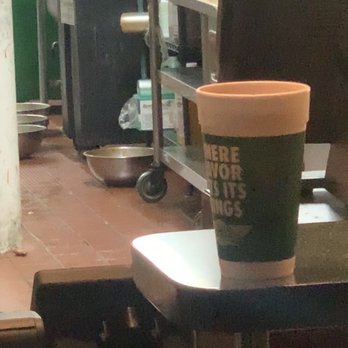 Wingstop - No glove on phone in the hand cooking - Chicken Wings Near Me - Perris, California