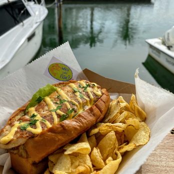 What The Fish Rolls - Casa Mar Roll, $13.50 --Fresh Local Catch (yellow jack), Cole Slaw, Lettuce, Ají Amarillo. - Seafood Near Me - Tavernier, Florida