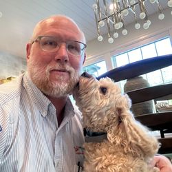 Mr. Appliance of Salt Lake City - Our technician Matt sure loves it when there are friendly pets at his job.