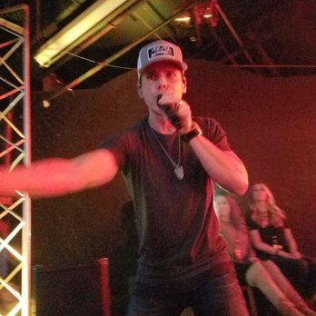 8 Seconds Saloon - a man in a baseball cap singing into a microphone - Dance Clubs Near Me - Indianapolis, Indiana 8 Seconds Saloon - a man in a baseball cap singing into a microphone - Dance Clubs Near Me - Indianapolis, Indiana