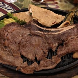 El Sabor del Tiempo - Prime rib with 2 quesadillas and sliced avocado.