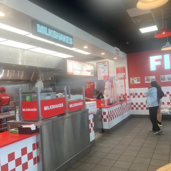 Five Guys - the inside of a fast food restaurant - Burgers Near Me - Normal, Illinois