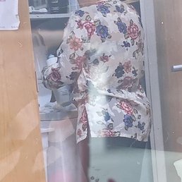Lady caught refilling shampoo bottles Lady caught refilling shampoo bottles