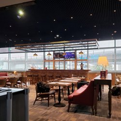 Primeclass Lounge - Bar and Seating Area at Primeclass Lounge FRA T2