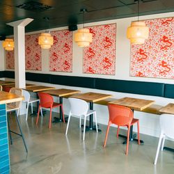 FOO BAO Asian Sliders - Casual dining room with banquette seating.
