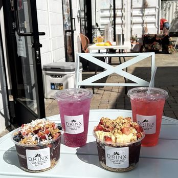 Drinx - a variety of drinks on a table - Cafes Near Me - Carolina Beach, North Carolina