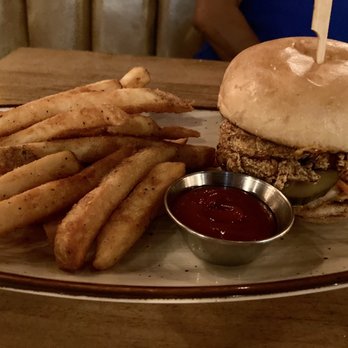 The Monroe - Orlando Hot Chicken Sandwich with fries. - New American Near Me - Orlando, Florida The Monroe - Orlando Hot Chicken Sandwich with fries. - New American Near Me - Orlando, Florida