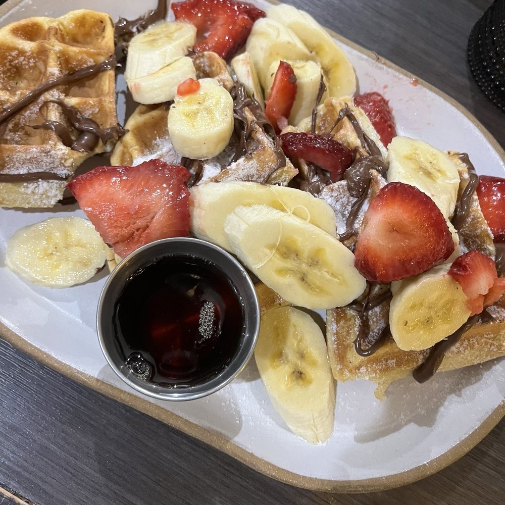 Brunch by De Martino - Strawberry Banana Nutella Buttermilk Waffle - Latin American Near Me - Somerville, New Jersey Brunch by De Martino - Strawberry Banana Nutella Buttermilk Waffle - Latin American Near Me - Somerville, New Jersey