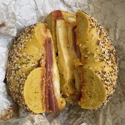 Egg everything bagel, with egg, yellow American cheese, taylor ham, salt, pepper, ketchup.. AMAZING Egg everything bagel, with egg, yellow American cheese, taylor ham, salt, pepper, ketchup.. AMAZING