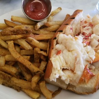 Neptune Oyster - Hot lobster roll with fries. Not the best but it's still good. Fries were average - Seafood Near Me - Boston, Massachusetts Neptune Oyster - Hot lobster roll with fries. Not the best but it's still good. Fries were average - Seafood Near Me - Boston, Massachusetts