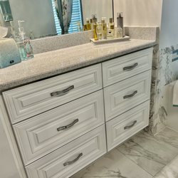 Eastern Kitchen - Side vanity with drawers in her bath.