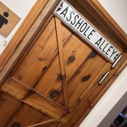 River Tavern Pizza - Men's restroom