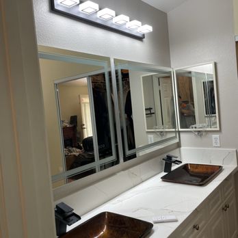 555 Construction - Side view of new double vanity with matching LED mirror and lights - General Contractors Near Me - Honolulu, Hawaii