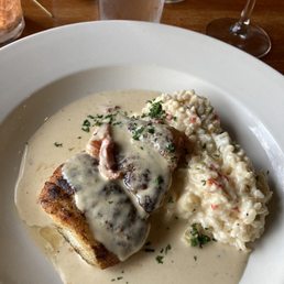 Catch of the day Corvina with risotto and beurre blanc