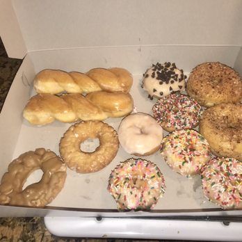 Foster's Donuts - These are the donuts I got minus the 2 my dog ate...lol. Buy a dozen donuts, get an additional 2 for free. - Donuts Near Me - Chatsworth, California