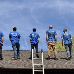Pure Aire Professional Air Duct Cleaning - A few of our technicians on a roof getting ready to clean some dryer vents
