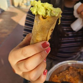 Mitla Cafe - Rolled guacamole shredded beef taco - Mexican Near Me - San Bernardino, California Mitla Cafe - Rolled guacamole shredded beef taco - Mexican Near Me - San Bernardino, California