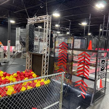 DEFY Charlotte - Employee on phone - Trampoline Parks Near Me - Charlotte, North Carolina