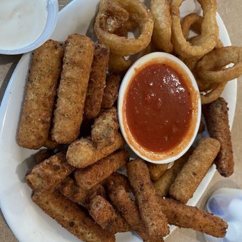 The Village Cafe - Fried platter with mozzarella sticks, zucchini, and onion rings. Comes with marinara and ranch. - American Near Me - Winnetka, California The Village Cafe - Fried platter with mozzarella sticks, zucchini, and onion rings. Comes with marinara and ranch. - American Near Me - Winnetka, California
