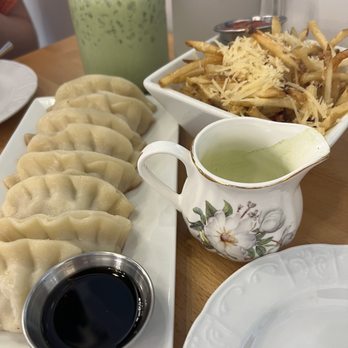 Proper Rose Garden - Pork dumplings (steamed) and garlic parm fries - Themed Cafes Near Me - Katy, Texas
