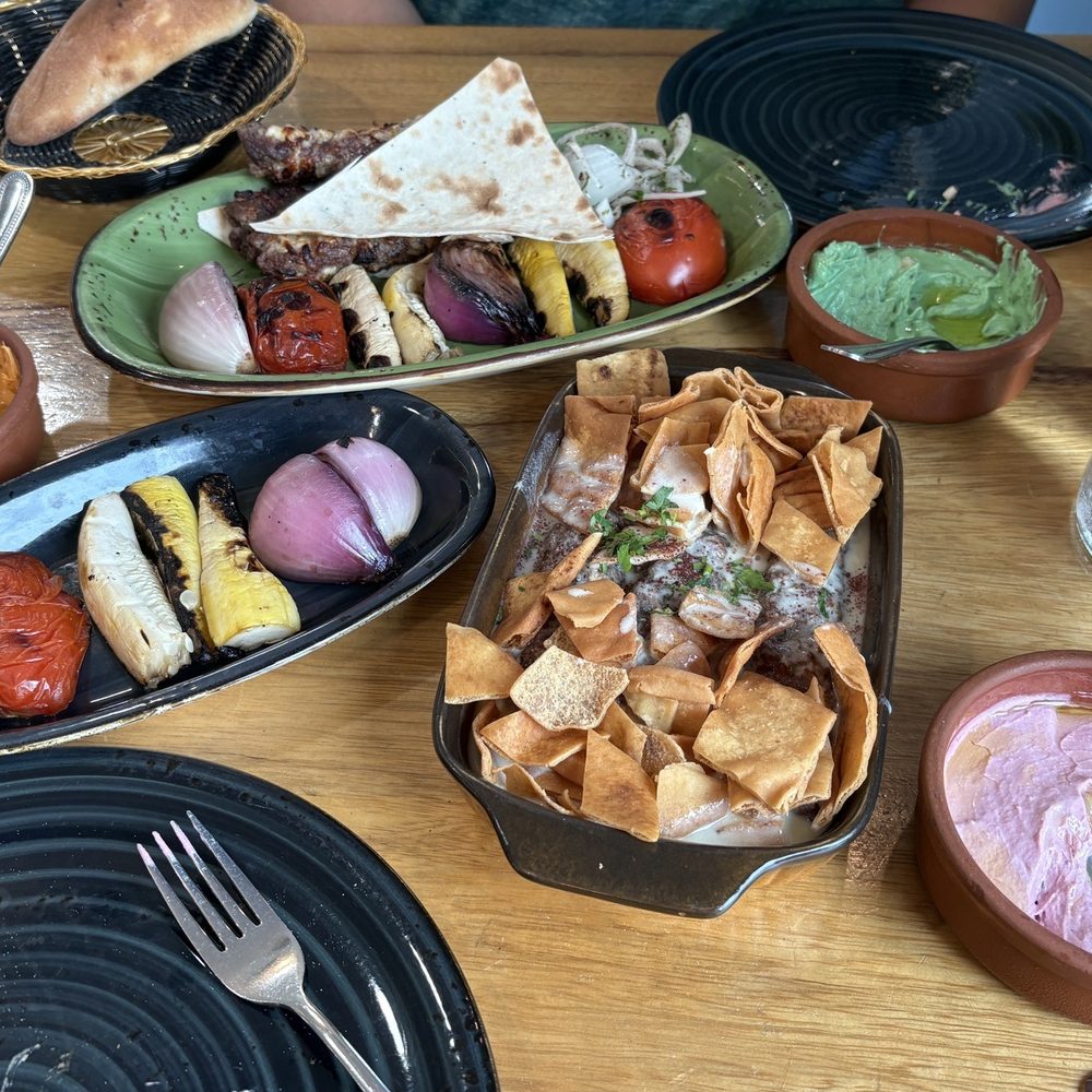 Kebabs with grilled vegetables, Hummus Trio with fresh bread. Kebabs with grilled vegetables, Hummus Trio with fresh bread.