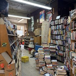 Red River Book Store - Piles and piles of books