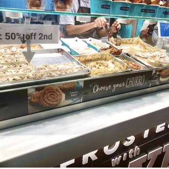 Cinnabon - a woman behind a bakery counter - Bakeries Near Me - Columbia, Maryland Cinnabon - a woman behind a bakery counter - Bakeries Near Me - Columbia, Maryland