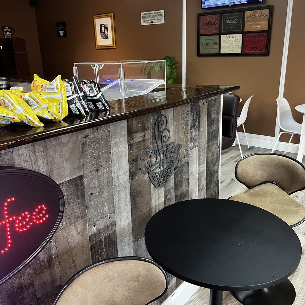 Demhaj Poetry Lounge - a bar and chairs - Coffee & Tea Near Me - High Point, North Carolina Demhaj Poetry Lounge - a bar and chairs - Coffee & Tea Near Me - High Point, North Carolina