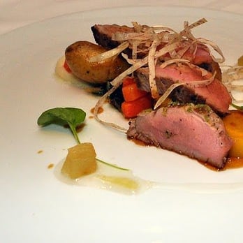 Canoe - Kozlik's Mustard Crusted Pork Loin, Smashed Fingerling Potatoes, Kale & Baked Apple - Canadian (New) Near Me - Toronto, Ontario