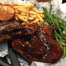 Three meats combo with chicken, ribs, brisket; fries, green beans and corn muffin Three meats combo with chicken, ribs, brisket; fries, green beans and corn muffin