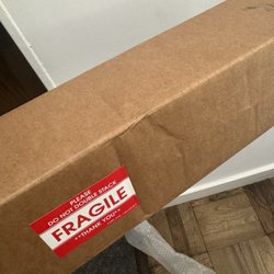 Landfall Navigation - Damaged shipping box.