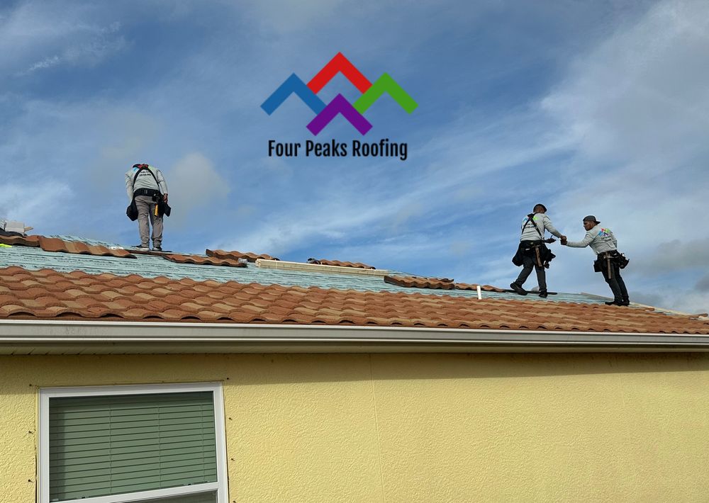 Slide of Four Peaks Roofing