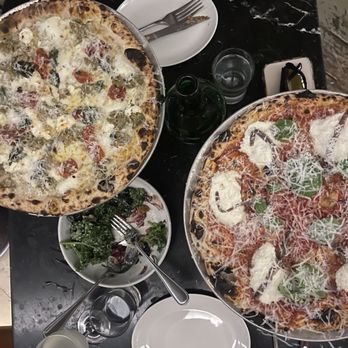 Elena - Sausage and anchovy pizza pies - Italian Near Me - Montreal, Quebec Elena - Sausage and anchovy pizza pies - Italian Near Me - Montreal, Quebec