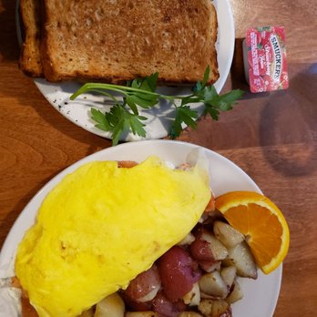 Tre Kronor - This is the smoked salmon omelette which is also filled with dill and cream cheese served with red skin potatoes and toast (your choice). - Breakfast & Brunch Near Me - Chicago, Illinois Tre Kronor - This is the smoked salmon omelette which is also filled with dill and cream cheese served with red skin potatoes and toast (your choice). - Breakfast & Brunch Near Me - Chicago, Illinois