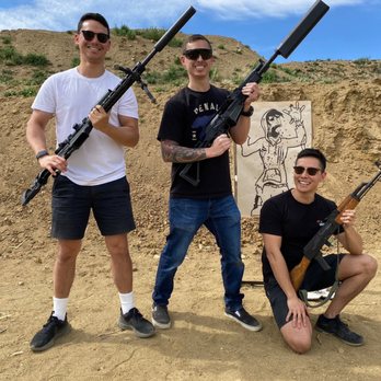 BASE Firearms - Got to pose with some epic firearms after the experience! - Firearm Training Near Me