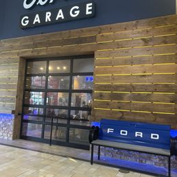 Exterior outside entrance of Ford's Garage Smith Haven - Side door entrance from Mall - Lake Grove, New York Exterior outside entrance of Ford's Garage Smith Haven - Side door entrance from Mall - Lake Grove, New York