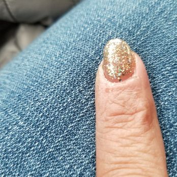 Tip Top Nails & Spa - Crooked and not completely painted.  Between the bottoms the sides of a few fingers and not completely down the nail on the others - Nail Salons Near Me - Worcester, Massachusetts