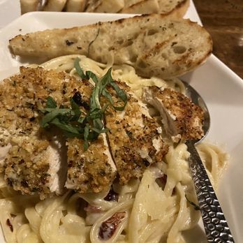 Essence Kitchen + Bar - applewood bacon and sun dried tomato fettuccine with parmesan crusted chicken So tasty - New American Near Me - Chino Valley, Arizona Essence Kitchen + Bar - applewood bacon and sun dried tomato fettuccine with parmesan crusted chicken So tasty - New American Near Me - Chino Valley, Arizona